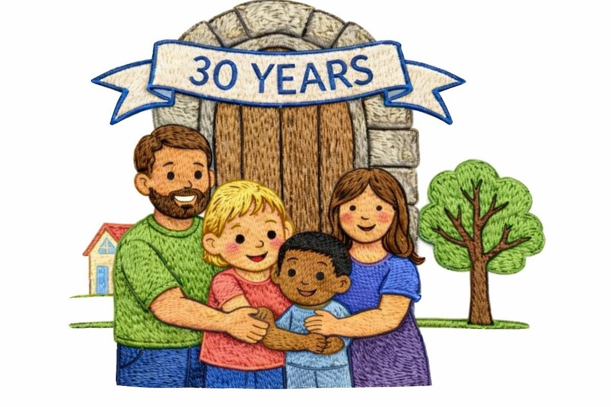 Family outside Peter Pan Preschool Petersfield